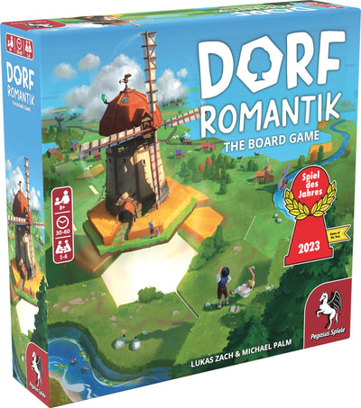 Colorful box art for Dorfromantik board game featuring a windmill, lush landscapes, and the game's title prominently displayed.