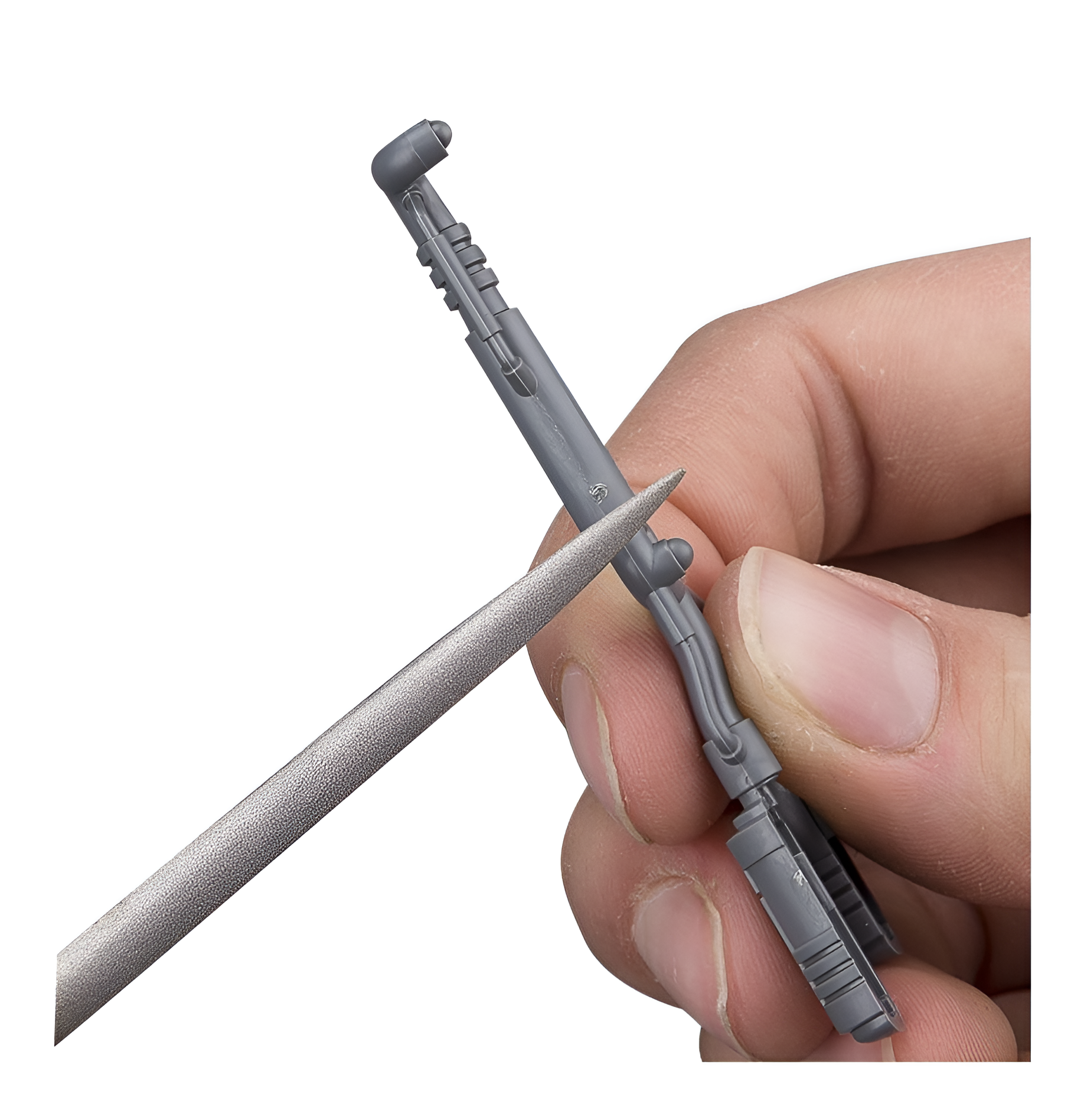 A hand holds a gray model part while using a Citadel file to smooth its edges, showcasing precision in miniature crafting.