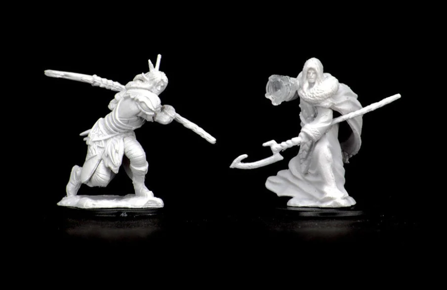 Unpainted miniatures of an elf male druid wielding a staff and a spear, ideal for Dungeons & Dragons gameplay.