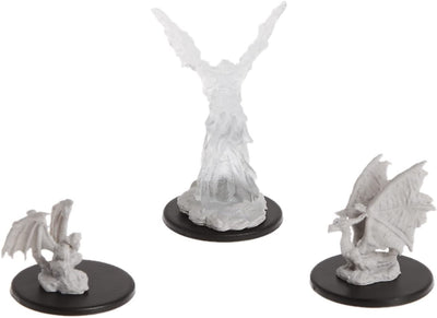 Unpainted miniatures from Dungeons & Dragons featuring three familiars: a small dragon, a bat, and a ghostly figure.