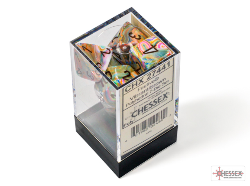 Chessex Festive Vibrant/Brown 7 Die Set displayed in a clear box, showcasing colorful polyhedral dice with vibrant patterns.