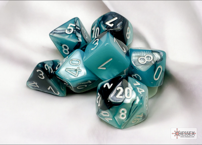 Chessex Gemini Black-Shell/White 7-die set featuring a mix of black and teal dice with white numbering.