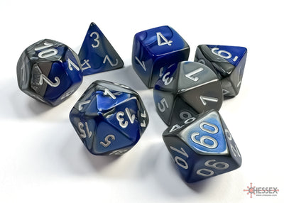 Chessex Gemini Blue/Steel 7-die set featuring polyhedral dice in blue and gray with silver numbering.