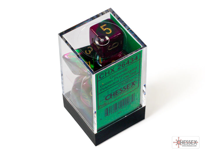 Chessex Gemini Green-Purple/Gold 7-die set displayed in a clear box with a green label and black base.