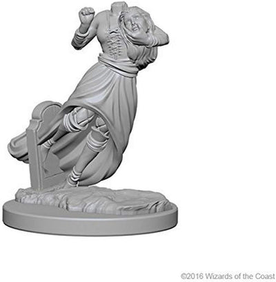 Unpainted miniature of a ghostly figure in a flowing dress, hovering above a gravestone, ideal for Dungeons & Dragons gameplay.