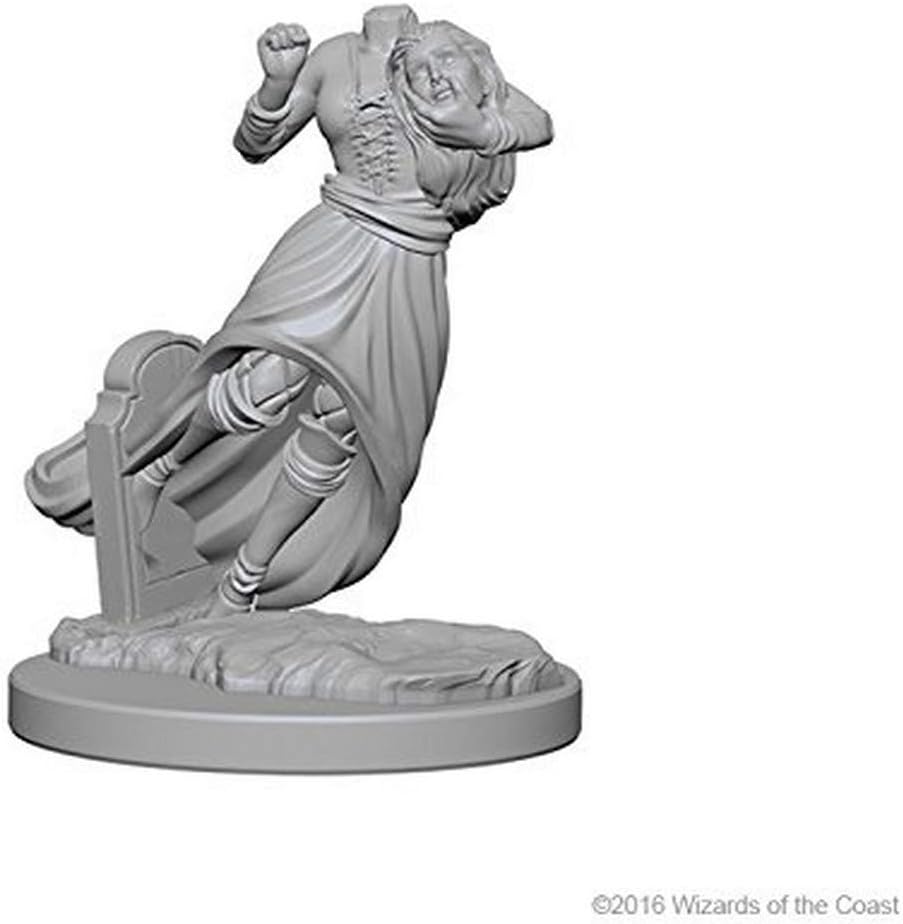 Unpainted miniature of a ghostly figure in a flowing dress, hovering above a gravestone, ideal for Dungeons & Dragons gameplay.