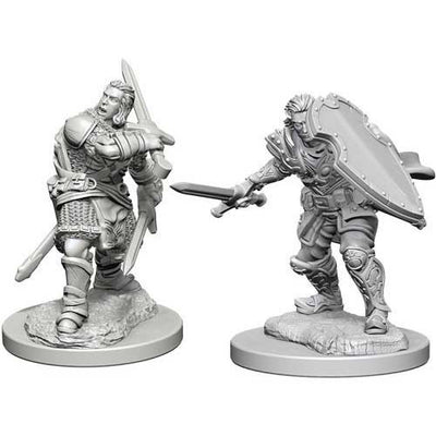 Unpainted Dungeons & Dragons miniatures featuring two human male paladins in dynamic poses, ready for tabletop gaming.
