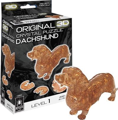 3D crystal puzzle of a dachshund, featuring transparent orange pieces and a box displaying the completed design.