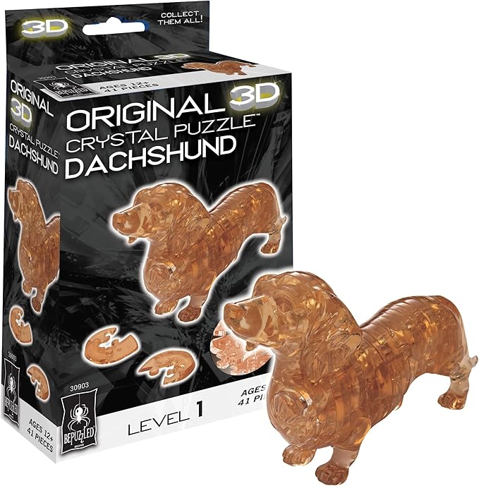 3D crystal puzzle of a dachshund, featuring transparent orange pieces and a box displaying the completed design.