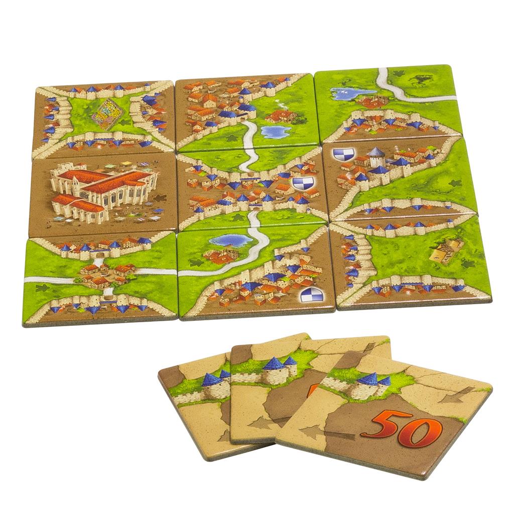 Carcassonne Expansion 1: Inns and Cathedrals game tiles featuring landscapes, cities, and scoring tiles for gameplay.