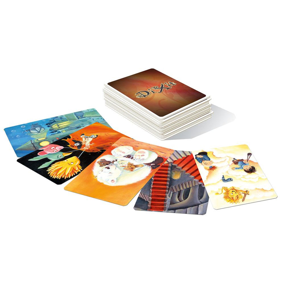 Dixit: Odyssey Expansion featuring a stack of colorful illustrated cards and several spread out cards showcasing imaginative artwork.