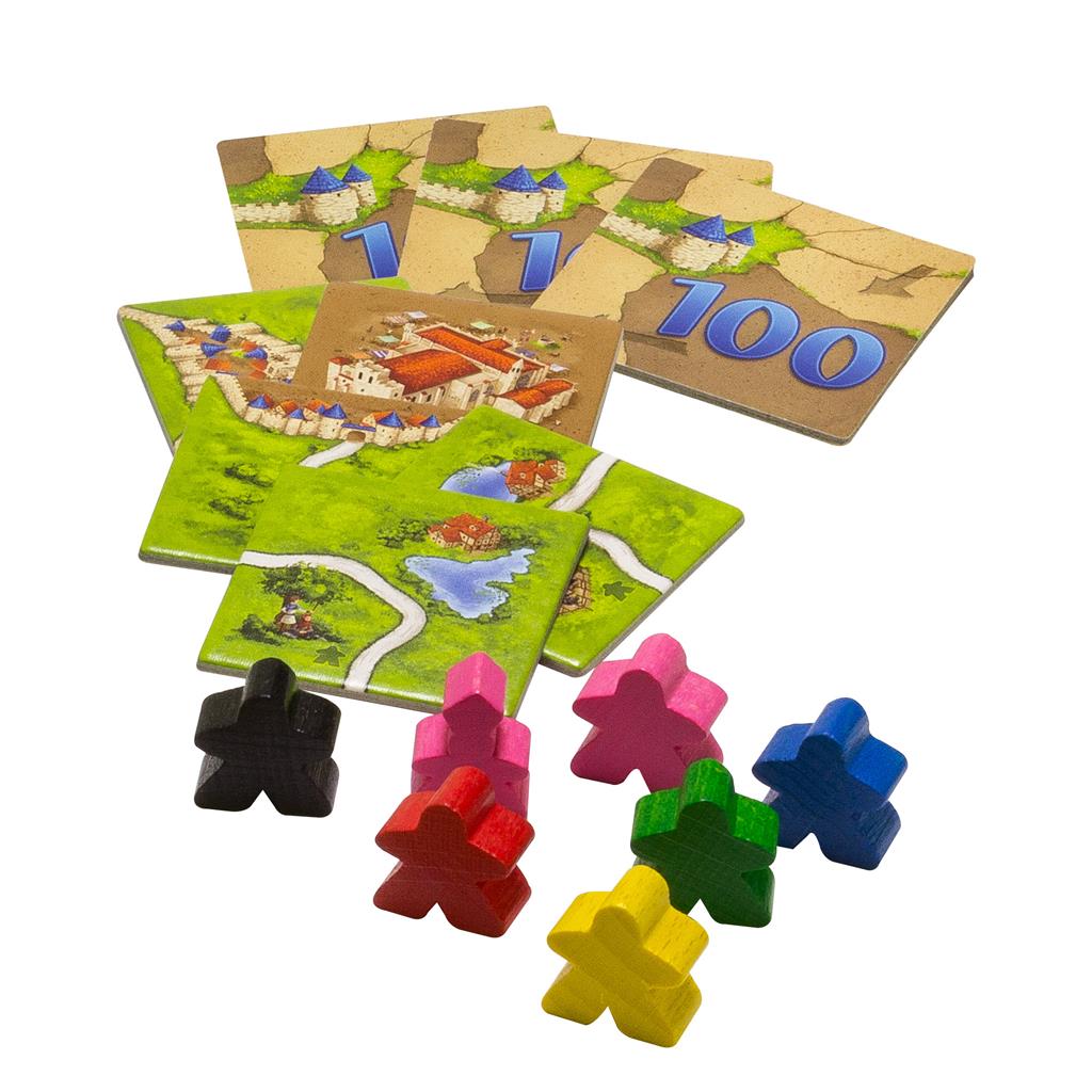Carcassonne Expansion 1: Inns and Cathedrals includes game tiles, scoring tiles, and colorful meeples in various colors.