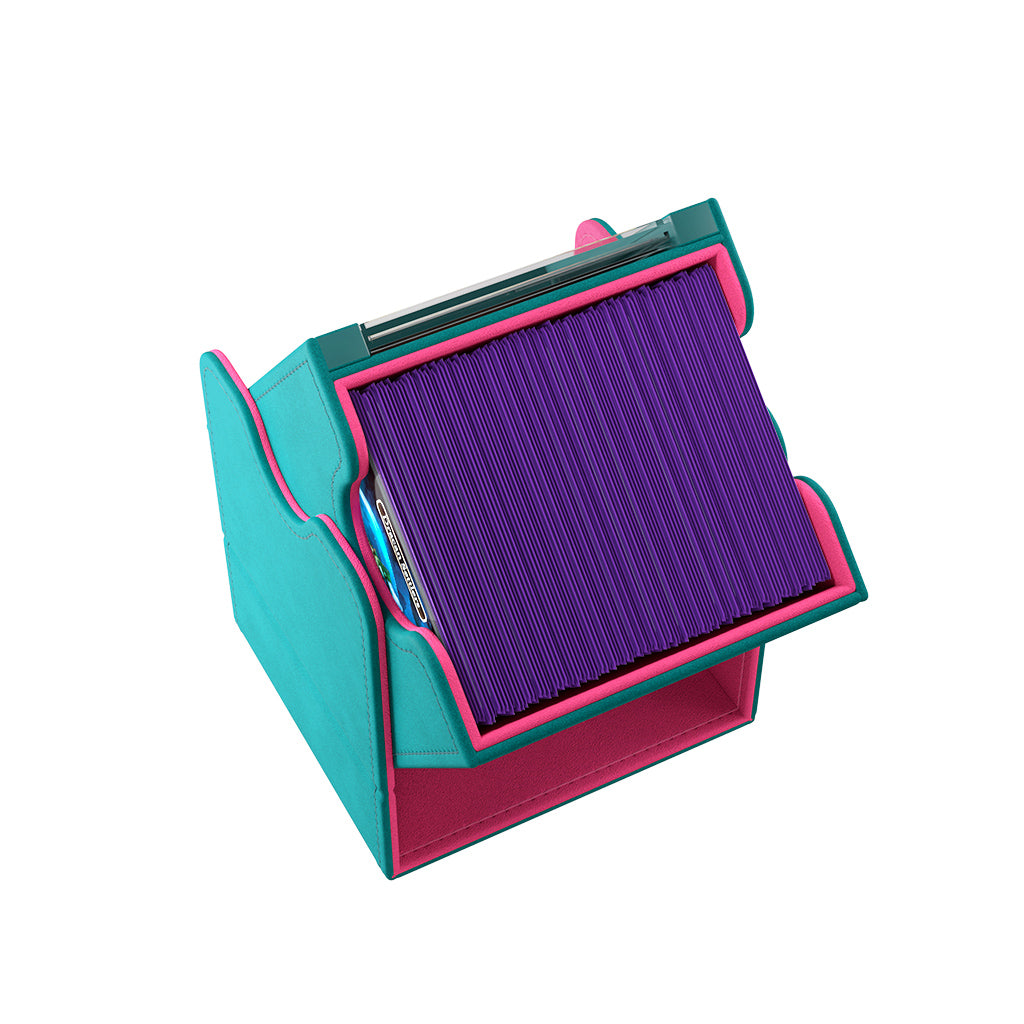 Gamegenic Deck Box Squire 100+ XL Convertible in teal and pink, showcasing a removable purple card tray and storage compartment.