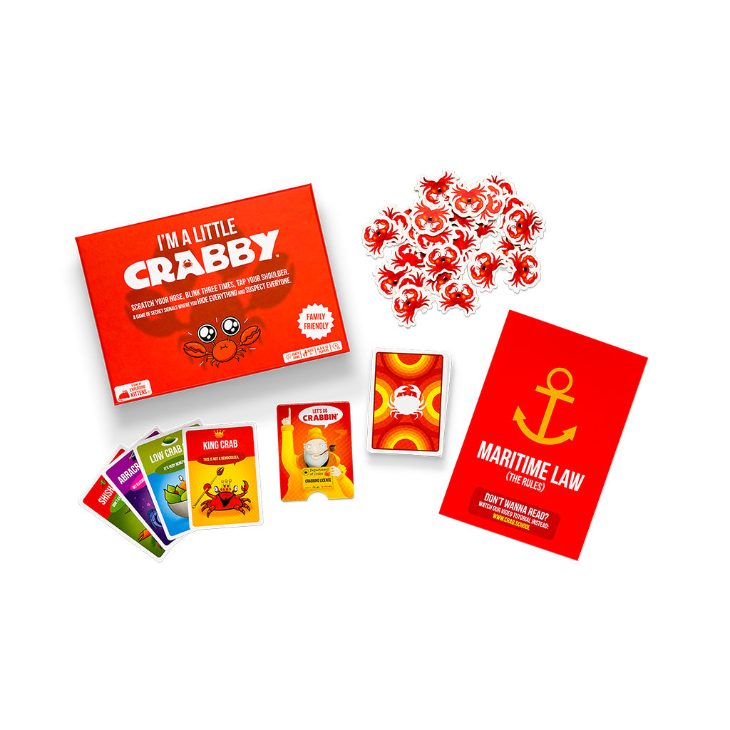 Colorful game box of "I'm a Little Crabby" with cards and crab tokens, designed for fun family gameplay.