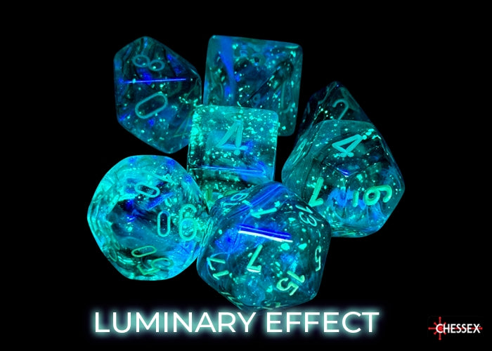 Chessex Borealis Kelp/Light Green Luminary 7-dice set glowing with blue accents against a dark background.