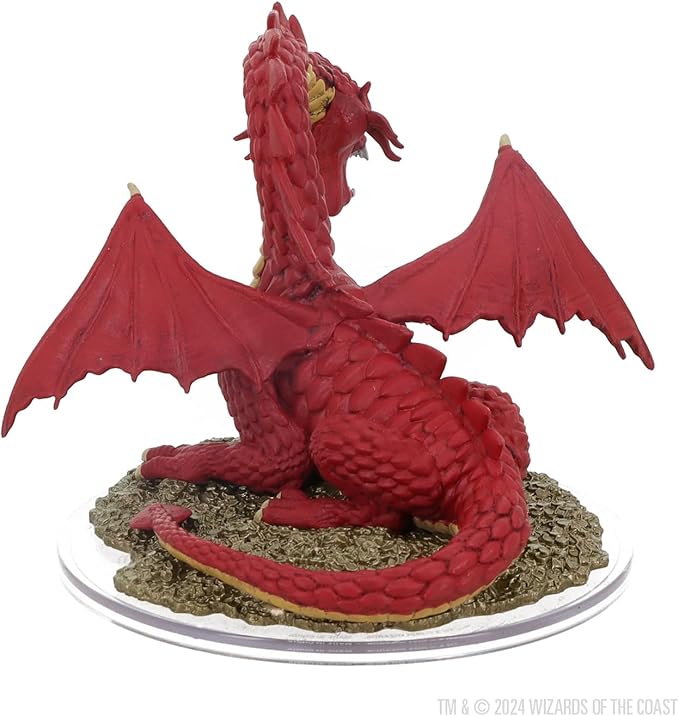 Classic red dragon miniature from Dungeons & Dragons, featuring detailed scales and wings, set on a rocky base.