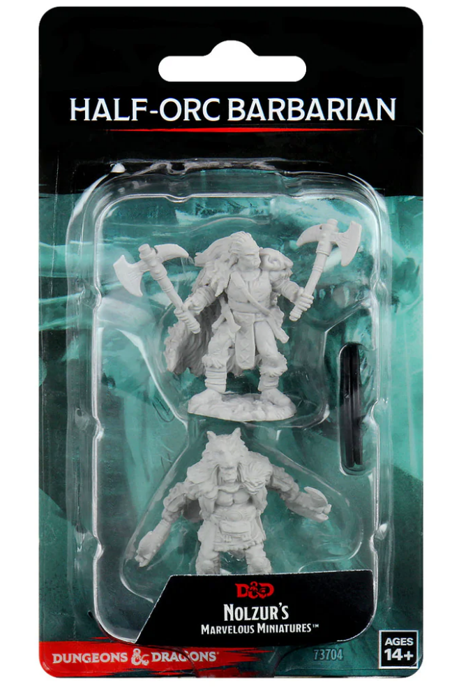 Unpainted miniatures of a male half-orc barbarian with two axes, packaged for Dungeons & Dragons gameplay.