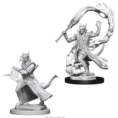 Unpainted miniature of a male Tiefling sorcerer from Dungeons & Dragons, featuring dynamic pose with flames and staff.