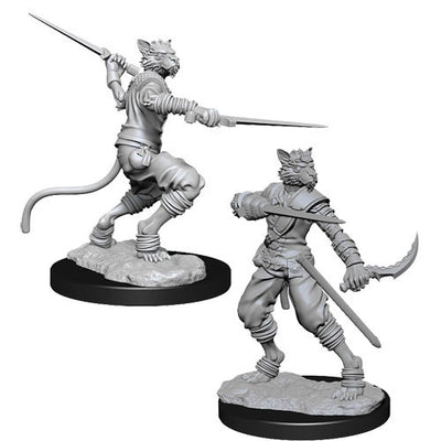 Unpainted Tabaxi male rogue miniature for Dungeons & Dragons, featuring dual weapons and dynamic pose on a textured base.