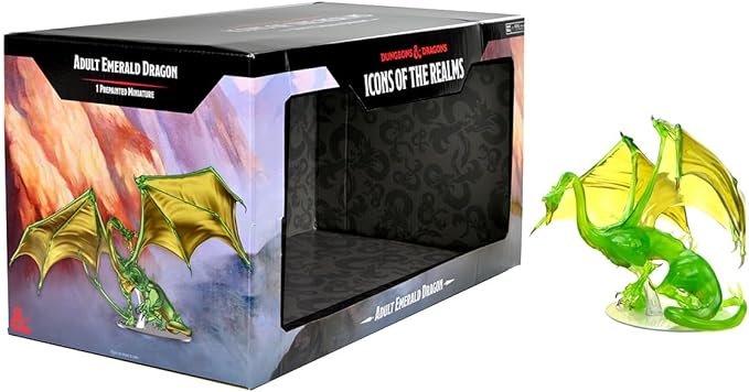 Premium figure of an Adult Emerald Dragon from Dungeons & Dragons, displayed next to its box featuring vibrant artwork.