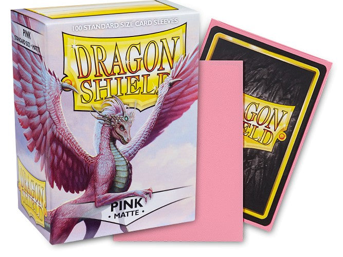 Dragon Shield Matte Sleeves in Pink, 100-count pack, featuring a vibrant dragon design on the box and smooth pink sleeves.
