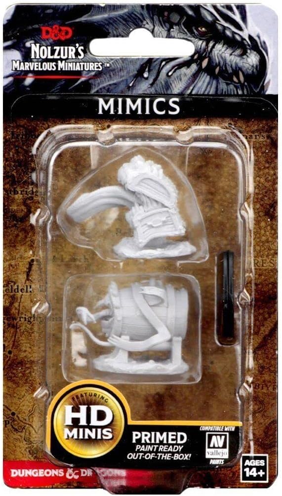 Unpainted Dungeons & Dragons Nolzur's Marvelous Miniatures set featuring two mimic miniatures, ready for painting.
