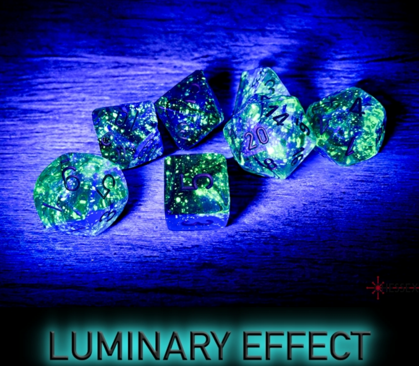 Chessex Nebula Oceanic Gold Luminary 7 Die Set glows under UV light, showcasing vibrant colors and intricate designs.