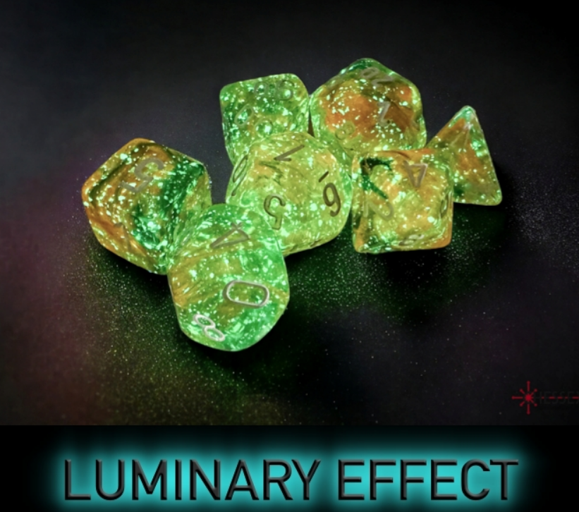 Chessex Nebula Spring White Luminary 7 Die Set featuring glowing green and orange dice with glittering effects.