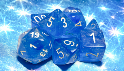 Chessex Borealis polyhedral dice set in sky blue and white, featuring seven dice with white numbers on a sparkling background.