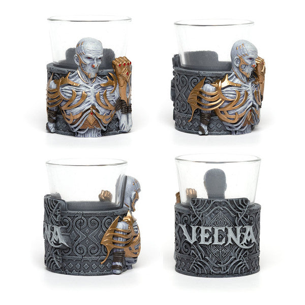 Dungeons & Dragons Mini Dice Cups Series Two featuring detailed skeletal designs and decorative bases, ideal for gaming.