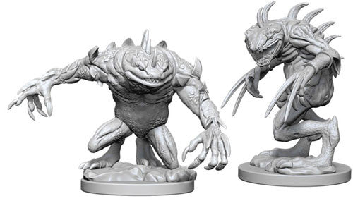 Unpainted miniatures of Grey Slaad and Death Slaad from Dungeons & Dragons, showcasing detailed features and dynamic poses.