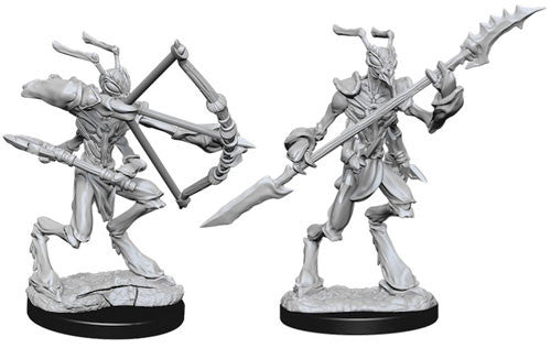 Unpainted Thri-Kreen miniatures for Dungeons & Dragons, featuring a warrior with a spear and a crossbow.