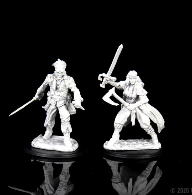 Unpainted miniatures of two vampire hunters, one wielding a sword and the other holding a crossbow, on black bases.