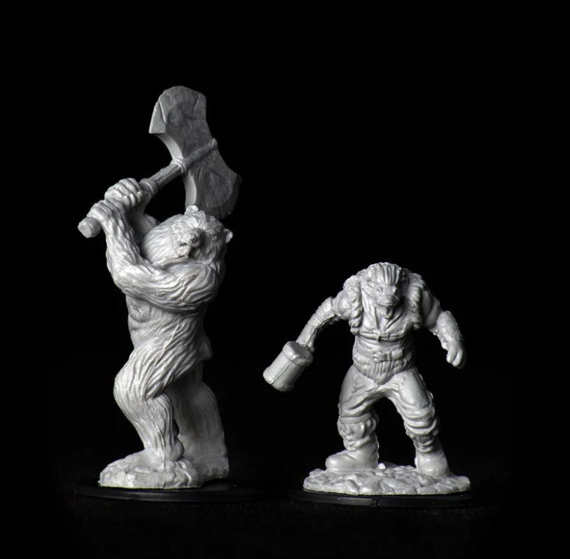Unpainted miniatures of a wereboar wielding a hammer and a werebear holding an axe, designed for Dungeons & Dragons gameplay.