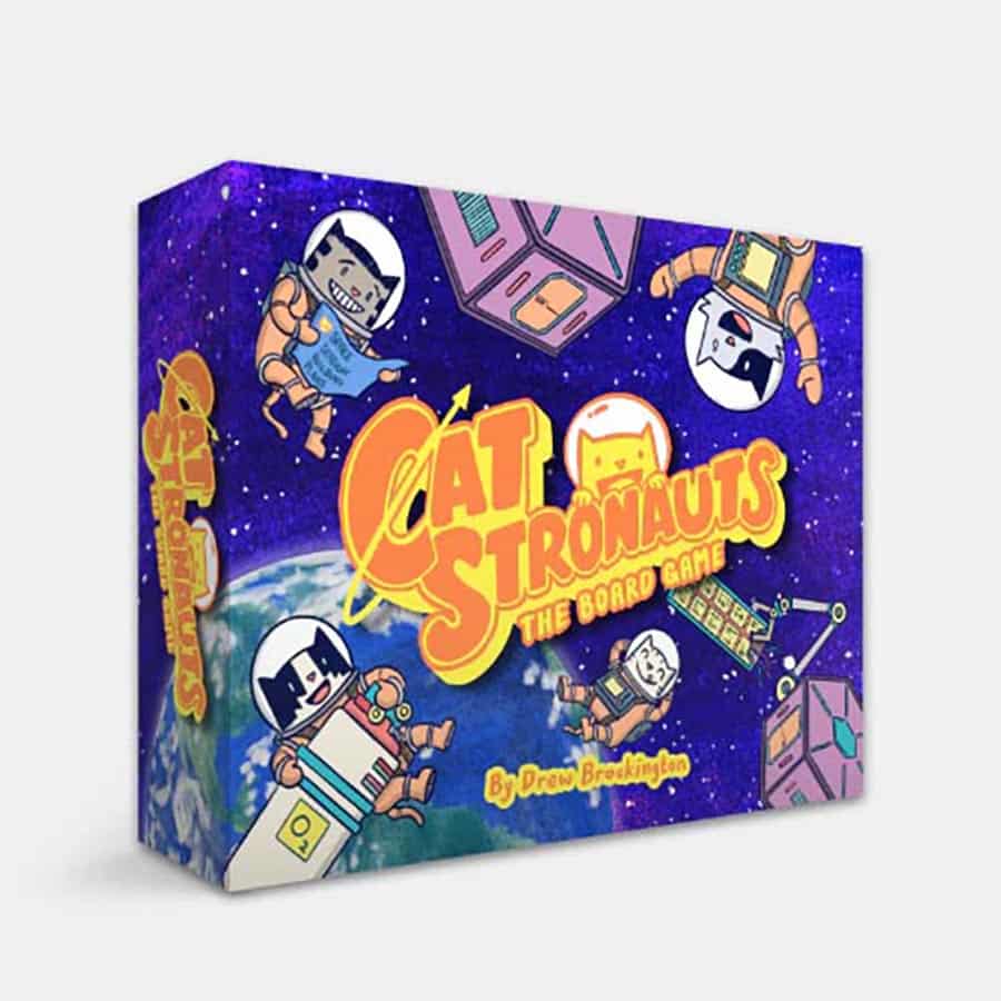 Colorful box for Catstronauts board game featuring cartoon cats in space suits, floating among planets and spacecraft.