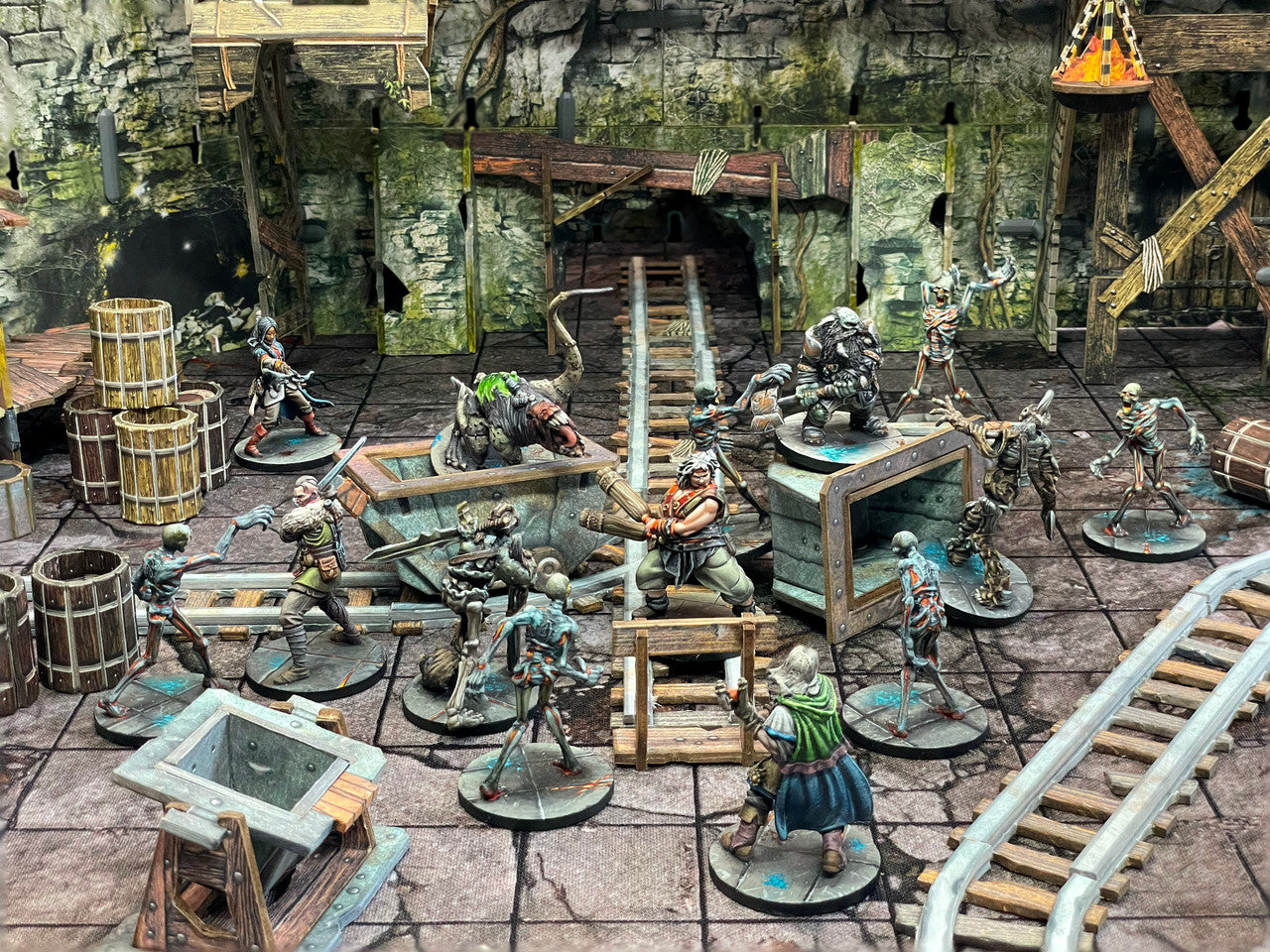 Detailed scene from Fantasy Dungeon: Mines of Meruta showing miniatures in a dungeon setting with skeletons and adventurers.