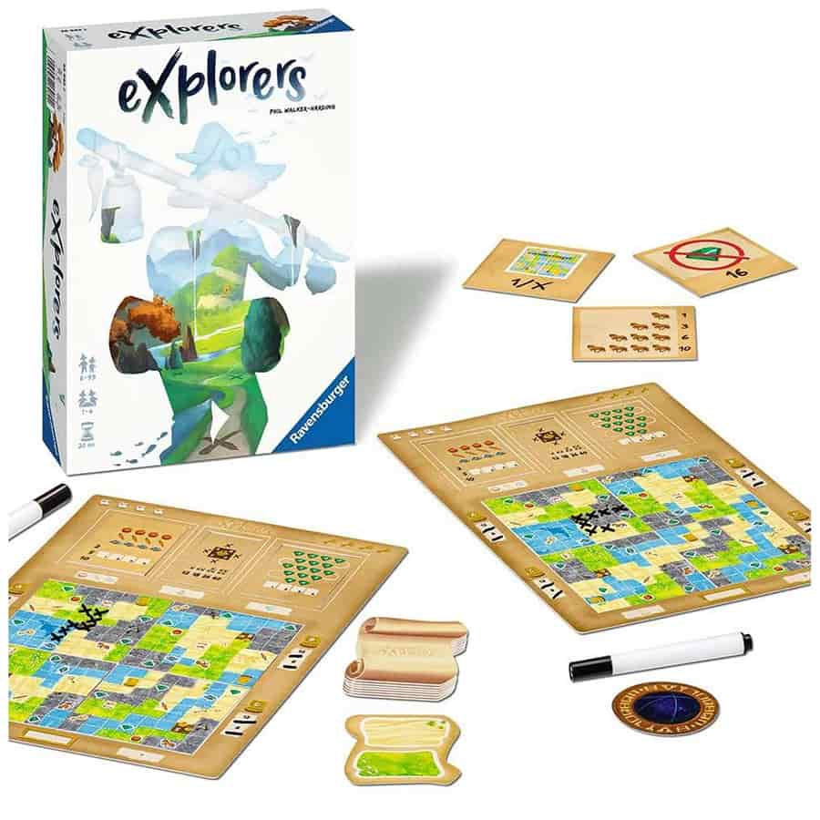 Board game "Explorers" with game boards, scoring sheets, and accessories, featuring a colorful exploration theme.